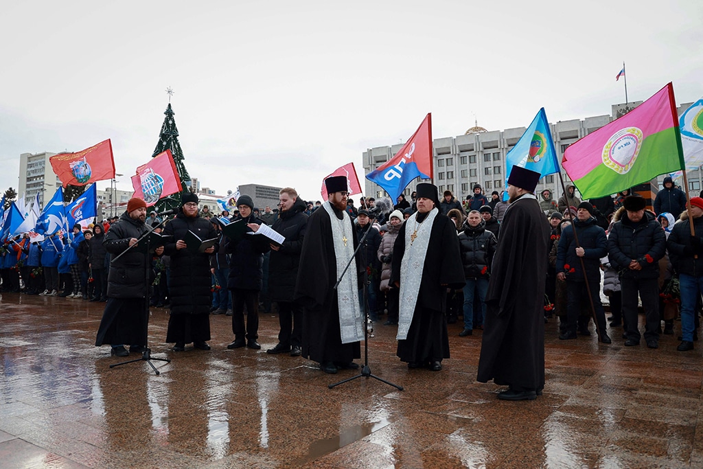 SAMARA: Mourners gather with priests to lay flowers in memory of more than 89 Russian soldiers that Russia says were killed in a Ukrainian strike on Russian-controlled territory, in Samara. – AFP