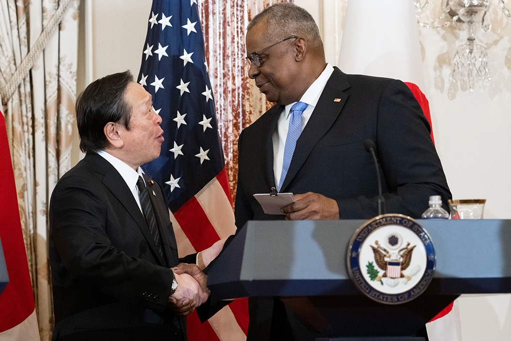 WASHINGTON: US Defense Secretary Lloyd Austin (R) shakes hands with Japanese Defense Minister Yasukazu Hamada following meetings at the US Department of State in Washington. – AFP