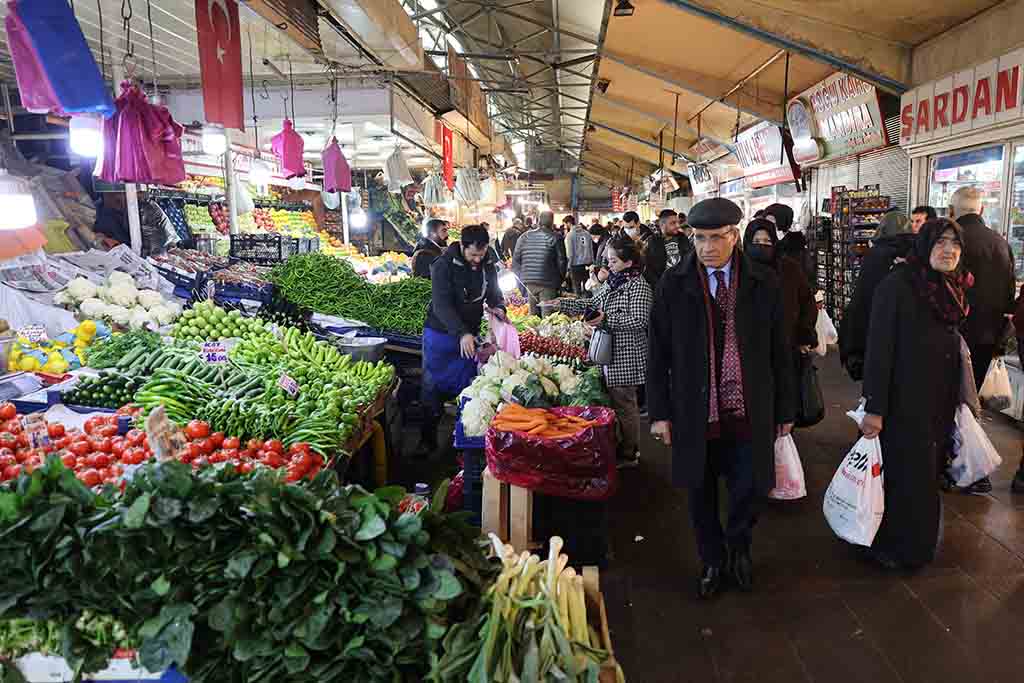 ANKARA: Shoppers buy vegetables and fruits at a public market in the historical district of Ulus in Ankara. – AFP