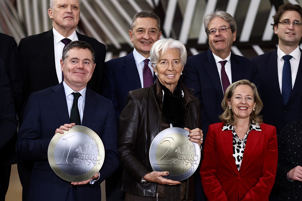 BRUSSELS: (L to R) President of the Eurogroup Paschal Donohoe, European Central Bank President Christine Lagarde and Spanish Finance Minister Nadia Calvino pose for a family photo during a Eurogroup meeting at the EU headquarters in Brussels. – AFP