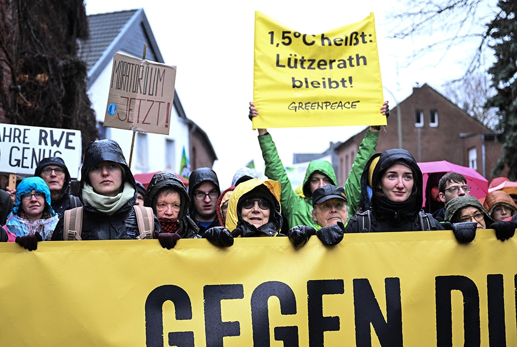 LUTZERATH: People attend a large-scale protest to stop the demolition of the village Luetzerath to make way for an open-air coal mine extension. - AFP