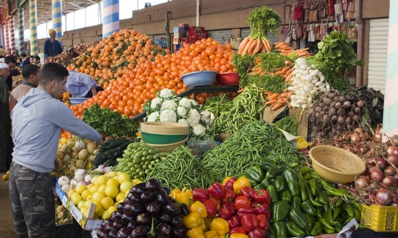 RABAT: Moroccans shop at a vegetable market.