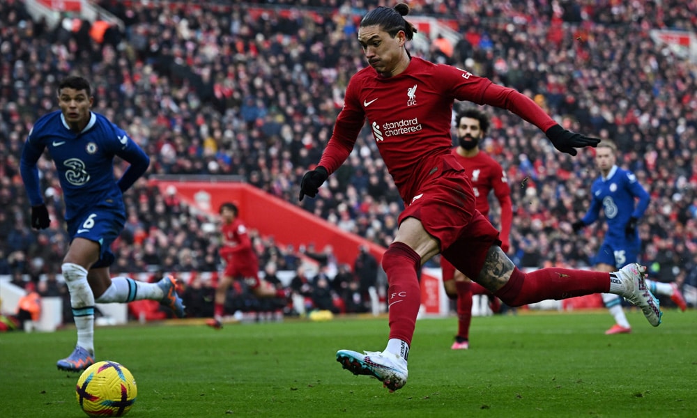 Liverpool's Uruguayan striker Darwin Nunez runs with the ball during the English Premier League football match between Liverpool and Chelsea at Anfield in Liverpool, north west England on January 21, 2023.