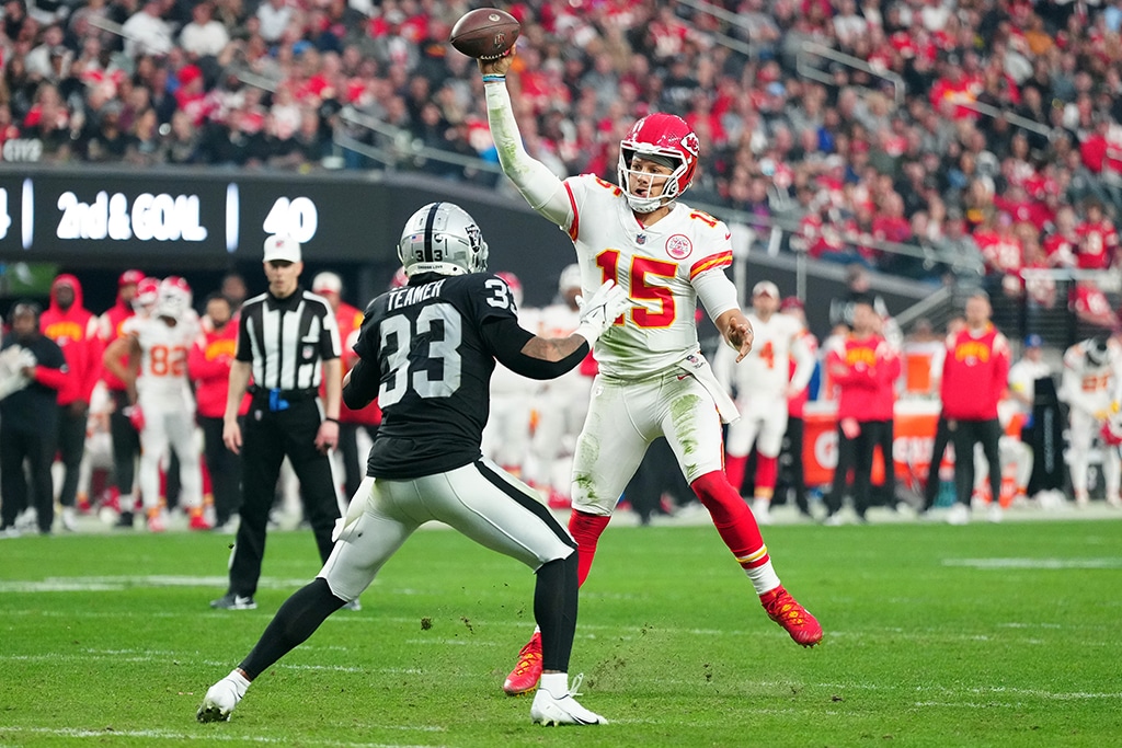 LAS VEGAS: Quarterback Patrick Mahomes of the Kansas City Chiefs attempts a pass against safety Roderic Teamer of the Las Vegas Raiders at Allegiant Stadium on Jan 7, 2023. - AFP