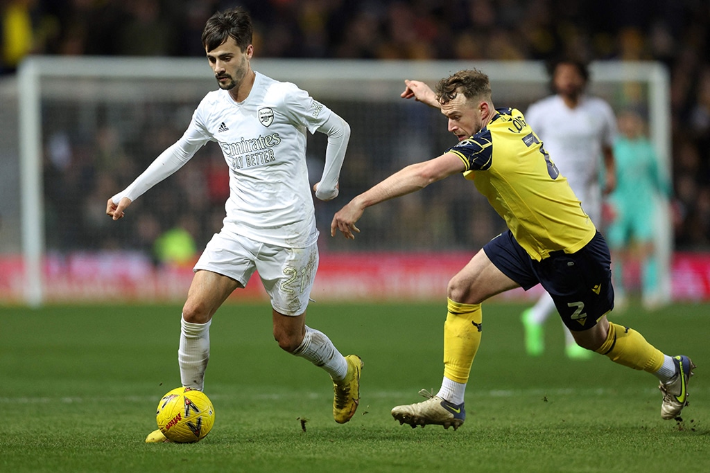 OXFORD: Arsenal's Portuguese midfielder Fabio Vieira fights for the ball with Oxford United's English defender Sam Long at Kassam Stadium on Jan 9, 2023. – AFP