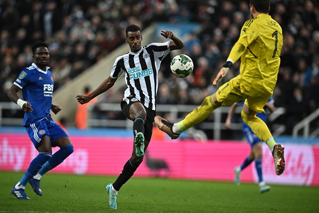 NEWCASTLE: Newcastle United's Swedish striker Alexander Isak vies with Leicester City's Welsh goalkeeper Danny Ward at St James' Park on Jan 10, 2023. – AFP