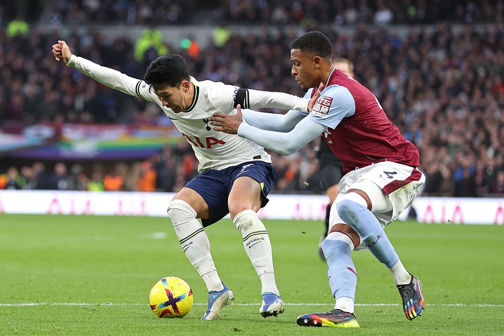 LONDON: Tottenham Hotspur's South Korean striker Son Heung-Min vies with Aston Villa's English defender Ezri Konsa during their English Premier League football match at Tottenham Hotspur Stadium on Jan 1, 2023. - AFP