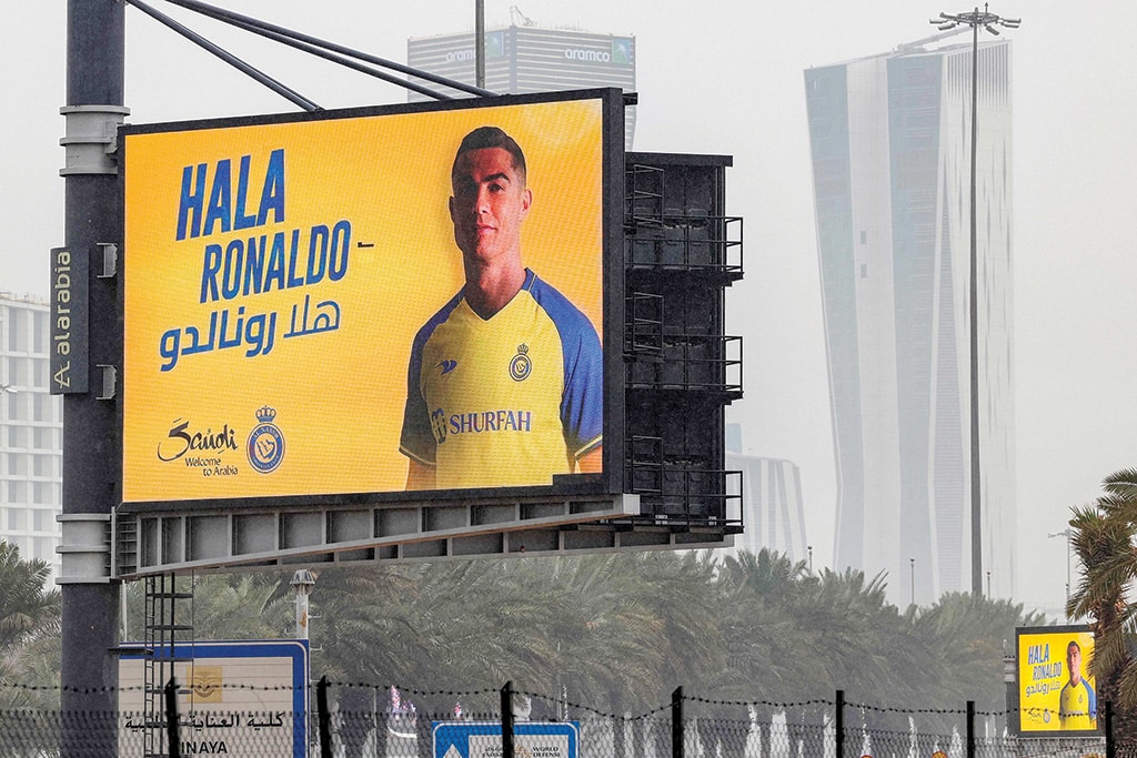RIYADH: A billboard welcoming Saudi football club Al Nassr's new Portuguese forward Cristiano Ronaldo is displayed along a road in the Saudi capital on Jan 3, 2023. - AFP