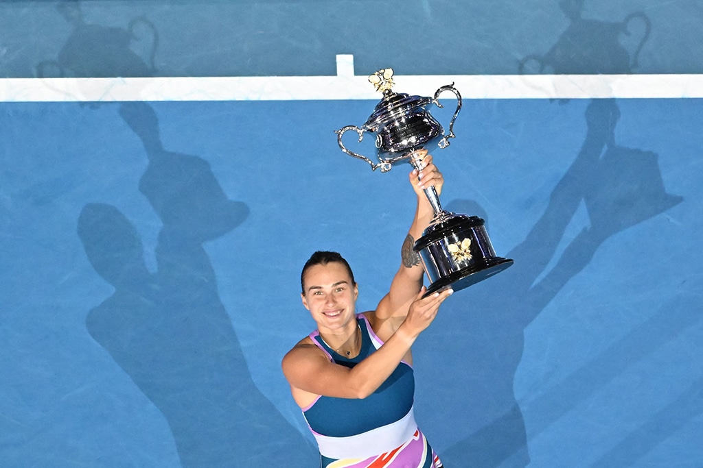 MELBOURNE: Belarus' Aryna Sabalenka poses with the Daphne Akhurst Memorial Cup after defeating Kazakhstan's Elena Rybakina in the women's singles final match of the Australian Open on Jan 28, 2023. - AFP