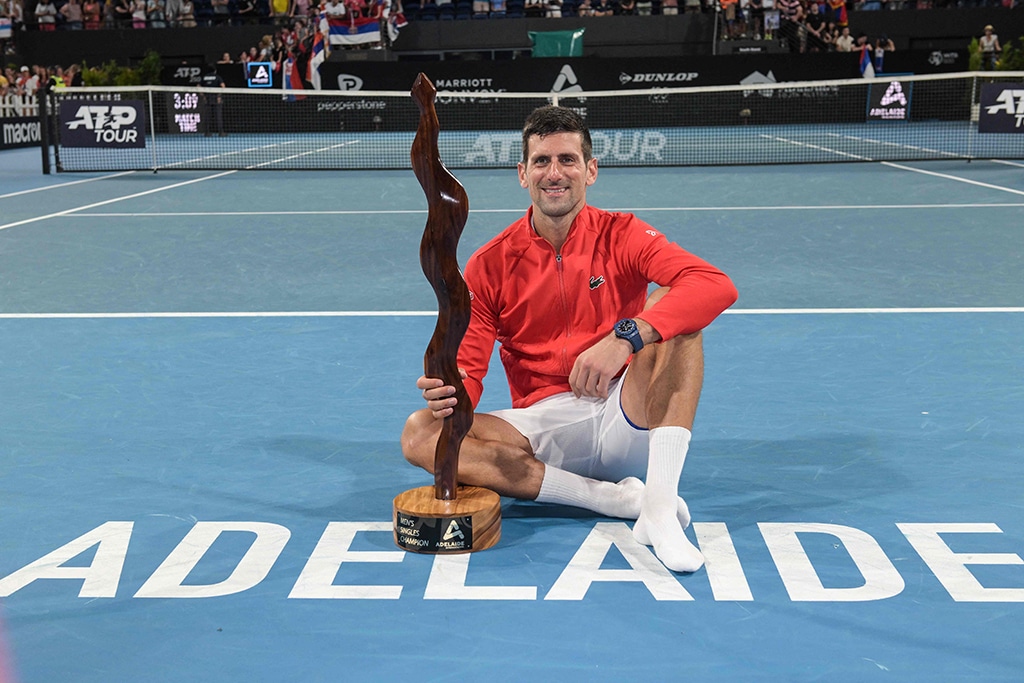 ADELAIDE: Serbian tennis player Novak Djokovic celebrates after winning the final of the ATP Adelaide International tournament against Sebastian Korda of the US on Jan 8, 2023. - AFP