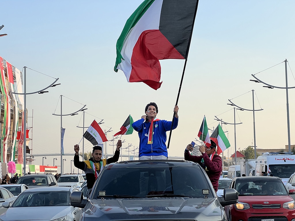 BASRA: Kuwaiti fans wave national flags in support of the Kuwaiti football team as they arrive for The Blues’ first match on Jan 7, 2023. – KUNA