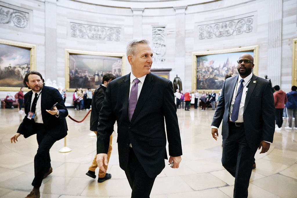 WASHINGTON: House Minority Leader Kevin McCarthy walks through the rotunda as he arrives at the US Capitol on Jan 4, 2023. - AFP