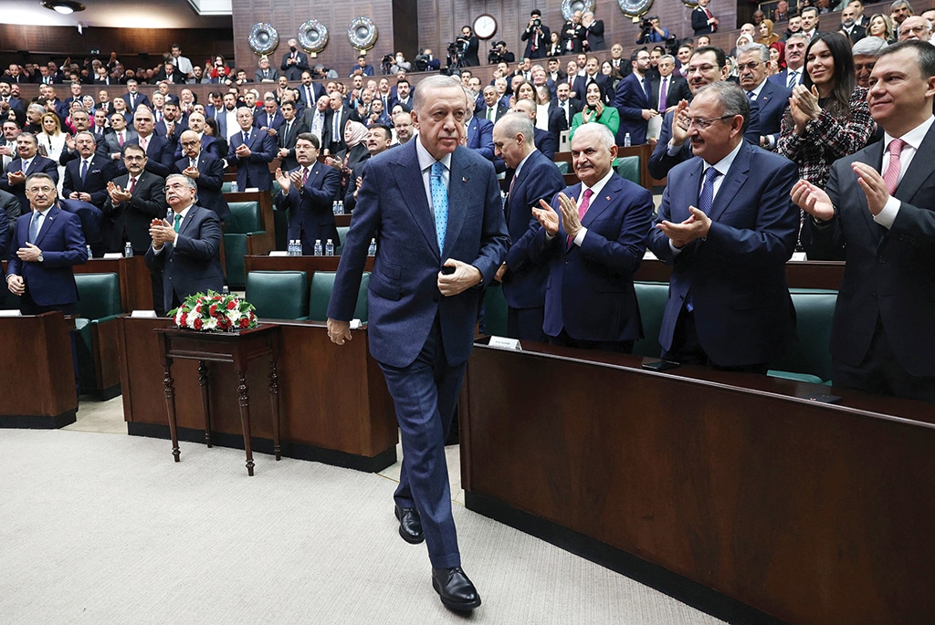ANKARA: Turkish President and leader of AKP Recep Tayyip Erdogan attends a group meeting at the Turkish Grand National Assembly on Jan 18, 2023. – AFP