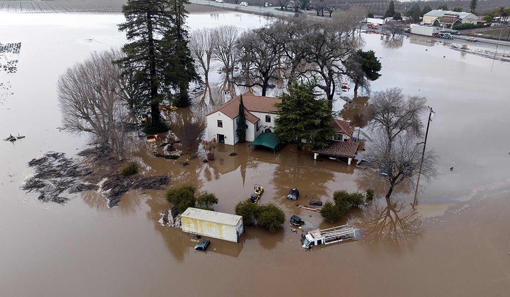 GILROY, California: This aerial view shows a flooded home partially underwater on Jan 9, 2023. – AFP