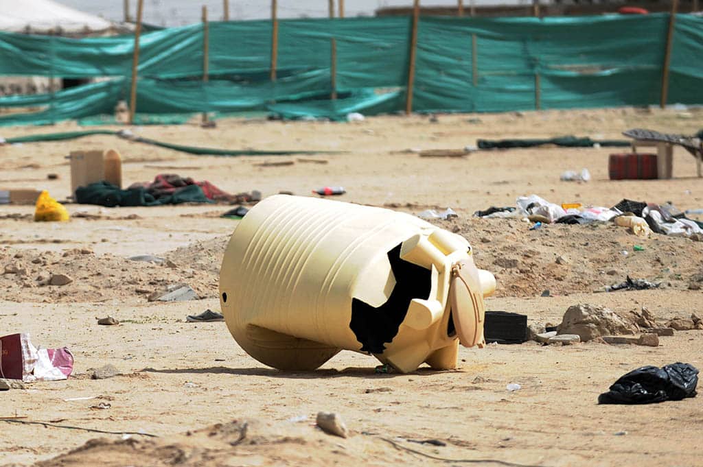 KUWAIT: Many campers leave behind mounds of garbage and leftovers as they leave their desert camps.