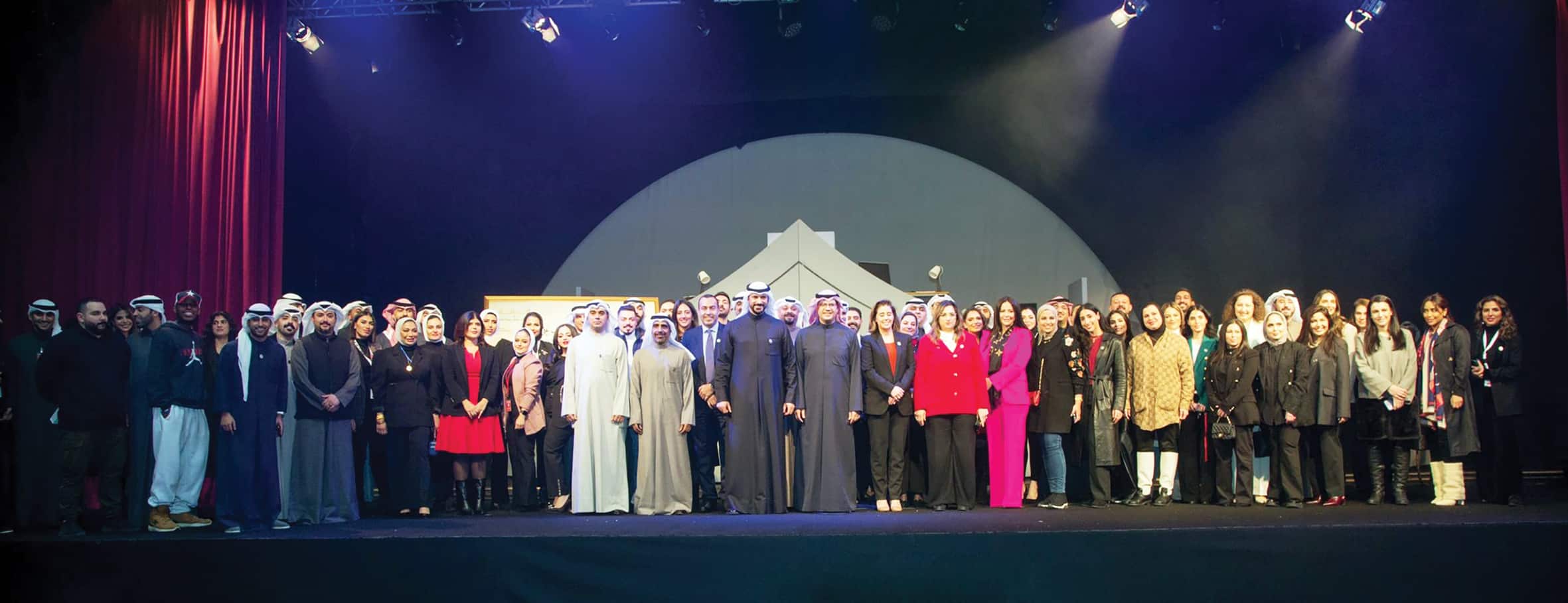A group photo of Gulf Bank’s employees during the draw.