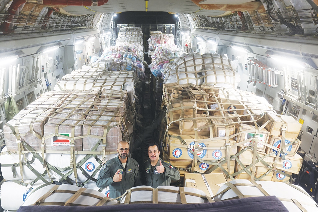 KUWAIT: Staff load aid supplies as Kuwait send two more military planes carrying 80 tons of relief, medical and nfood supplies to Turkey in the aftermath of a magnitude 7.7 earthquake. — Photo by Yasser Al-Zayyat