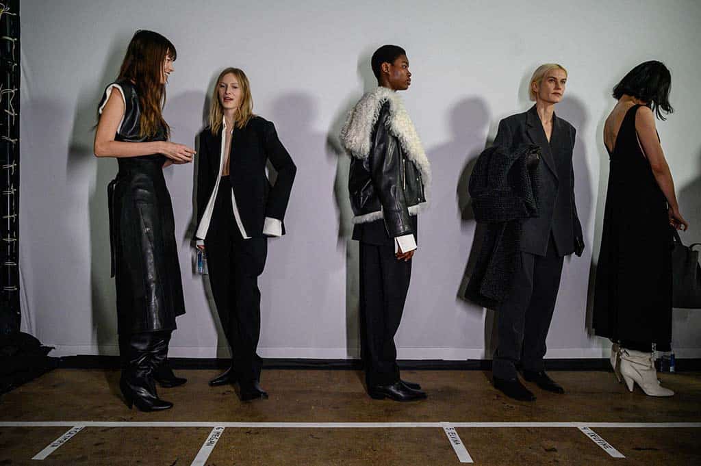 Models wearing creations by Proenza Schouler gather backstage prior to their runway show during New York Fashion Week.— AFP photos