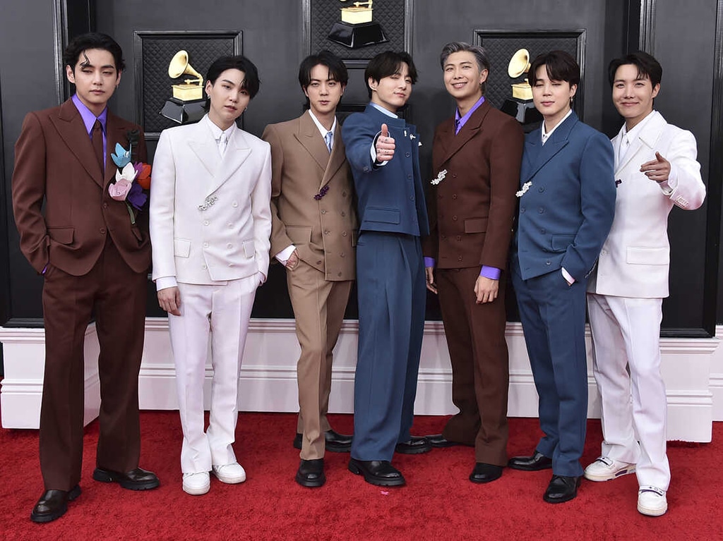 FILE - Korean group BTS appears at the 64th Annual Grammy Awards in Las Vegas on April 3, 2022. BTS, the Grammy-nominated South Korean boy band, will join President Joe Biden next week to talk about “Asian inclusion and representation” and to address hate crimes and discrimination against Asians, the White House announced Thursday, May 26. (Photo by Jordan Strauss/Invision/AP, File)