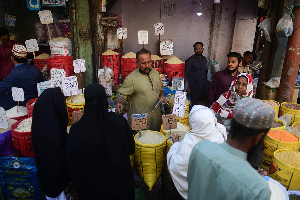 KARACHI: People buy rice at a market on Feb 3, 2023. - AFP
