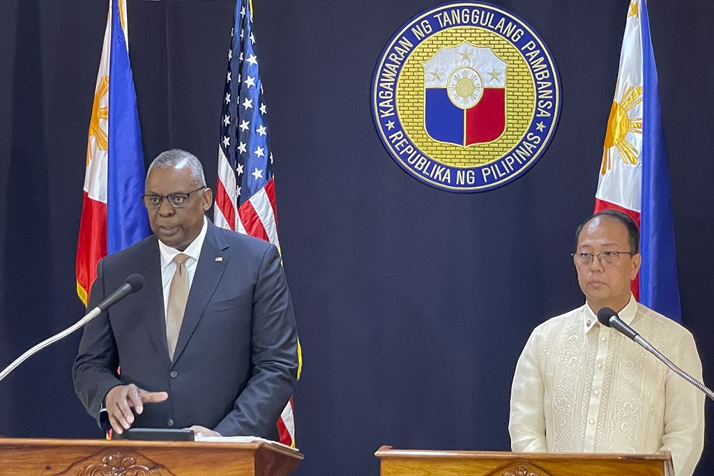 MANILA: US Defense Secretary Lloyd Austin III (L) talks beside his Philippine counterpart Carlito Galvez Jr at a joint press conference in Camp Aguinaldo military headquarters in metro Manila. - AFP