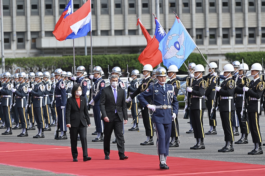 TAIPEI: Paraguay's President Mario Abdo Benitez (C) and Taiwan's President Tsai Ing-wen (L) inspect an honour guard during a welcome ceremony at the Presidential Office in Taipei on February 16, 2023. – AFP
