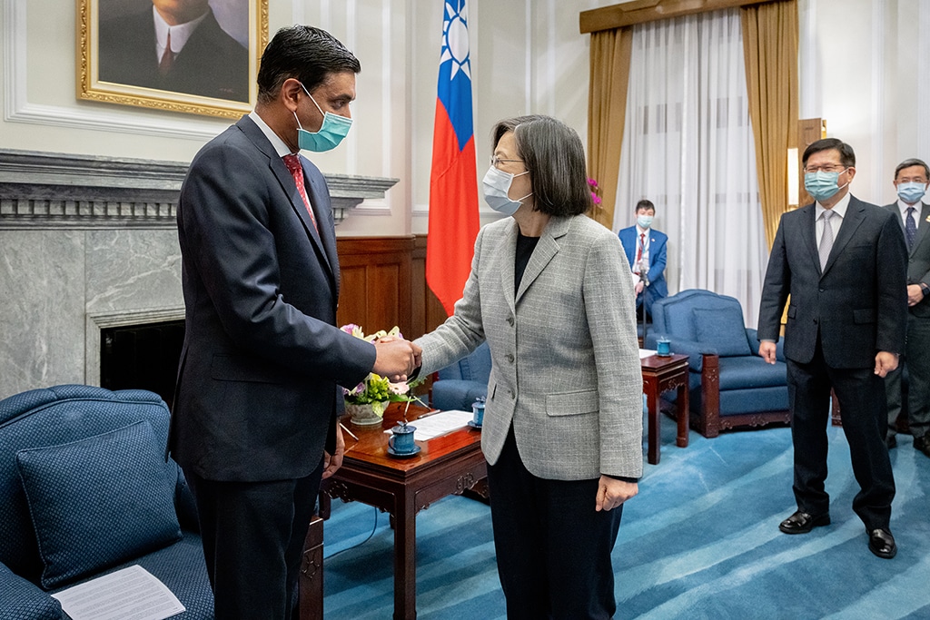 TAIPEI: Handout picture taken and released by Taiwan Presidential Office on February 21, 2023 shows Taiwan President Tsai Ing-wen (C) shaking hands with US Representative Ro Khanna at the Presidential Office in Taipei. – AFP