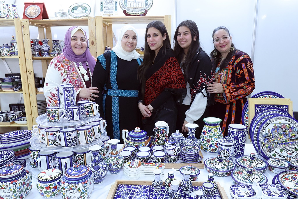 KUWAIT: Attendees pose with beautiful handmade pottery at the Palestinian Heritage Center exhibition on Monday, February 13, 2023. — Photos by Yasser Al-Zayyat