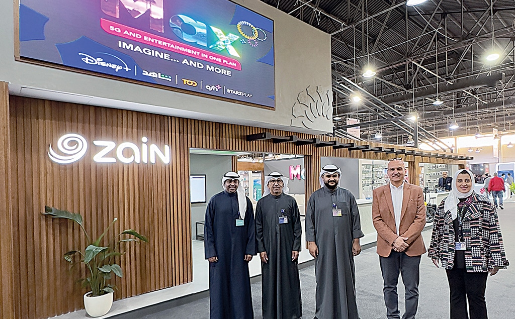 Zain officials at the company's booth.