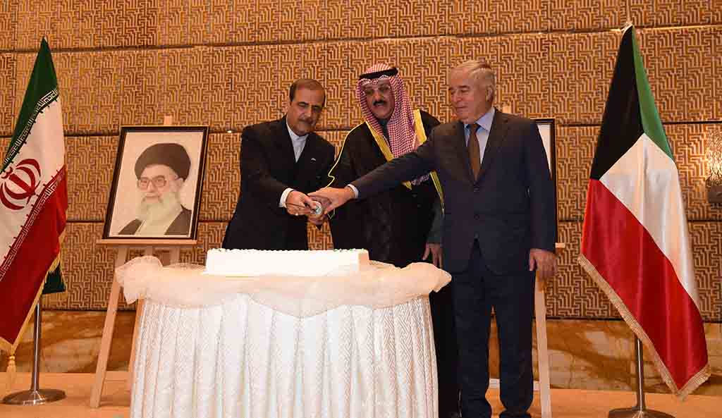KUWAIT: (From left) Iranian Ambassador to Kuwait Mohammed Irani, Assistant Foreign Minister for Asian Affairs Ambassador Samih Jawhar Hayat and Dean of the Diplomatic Corps Zabidullah Zabidov cut the ceremonial cake during celebrations marking Iran's National Day. -  Photo by Yasser Al-Zayyat