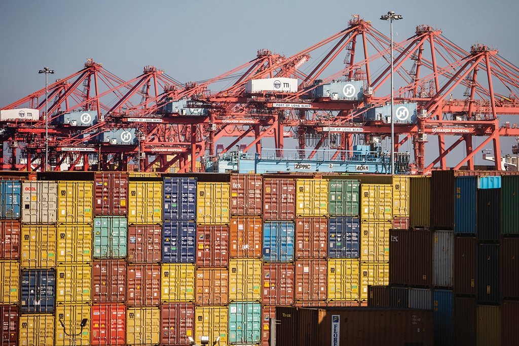 LONG BEACH, US: In this file photo taken on November 17, 2021 gantry cranes and shipping containers are seen at the Port of Long Beach in Long Beach, California. - AFP