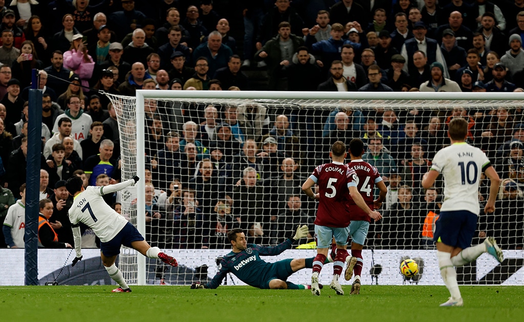 LONDON: Tottenham Hotspur's South Korean striker Son Heung-Min (left) scores the team's second goal during the English Premier League football match between Tottenham Hotspur and West Ham United on February 19, 2023. - AFP