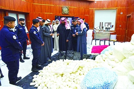 KUWAIT: Interior Minister Sheikh Talal Al-Khaled Al-Ahmad Al-Sabah supervises the drugs seizure. - KUNA
