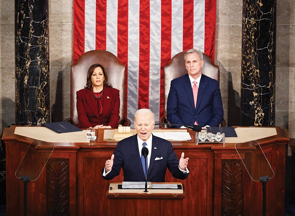 WASHINGTON: US Vice President Kamala Harris and US Speaker of the House Kevin McCarthy listen as US President Joe Biden delivers the State of the Union address in the House Chamber of the US Capitol on Feb 7, 2023. - AFP