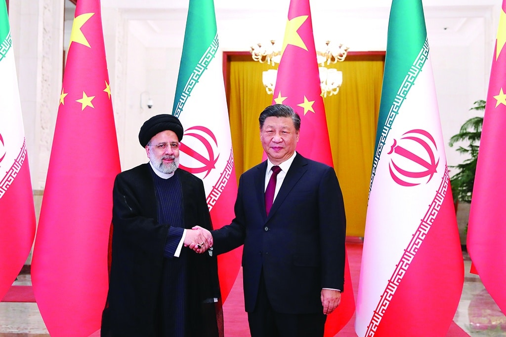BEIJING: Chinese President Xi Jinping welcomes Iranian President Ebrahim Raisi during his visit on Feb 14, 2023. - AFP