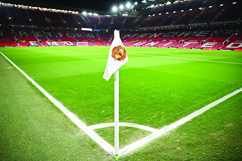 MANCHESTER: A Manchester United flag is pictured on the corner of the pitch prior to the start of the English Premier League football match on February 8, 2023. – AFP