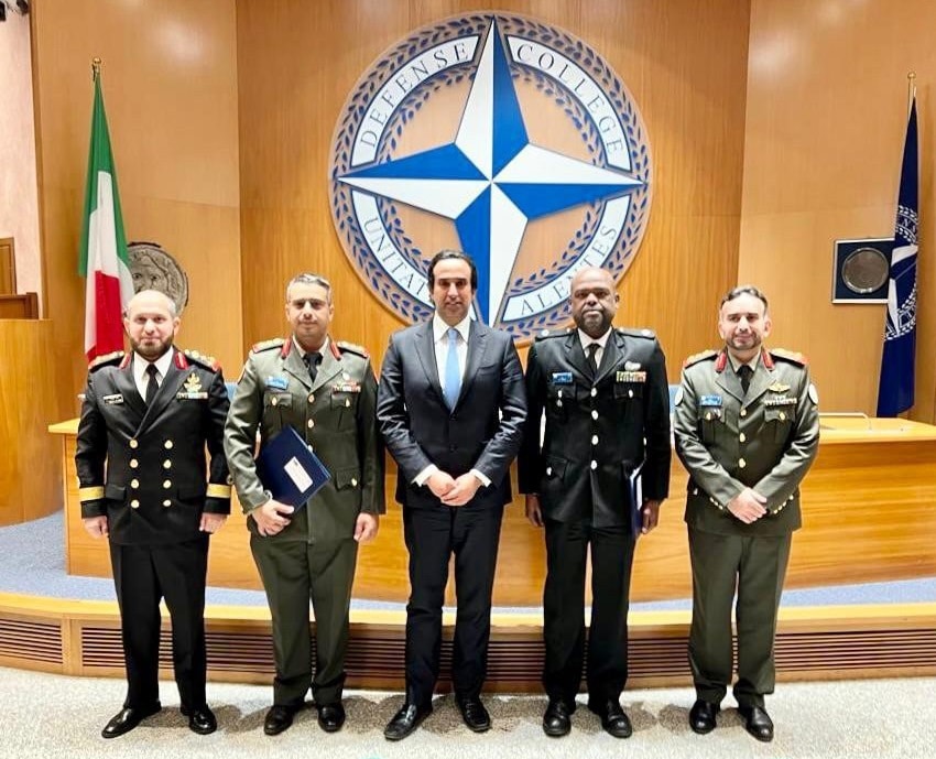 Kuwaiti Ambassador to Italy Nasser Al-Qahtani poses for a group photo during his participation in the graduation ceremony for two Kuwaiti officers. - KUNA