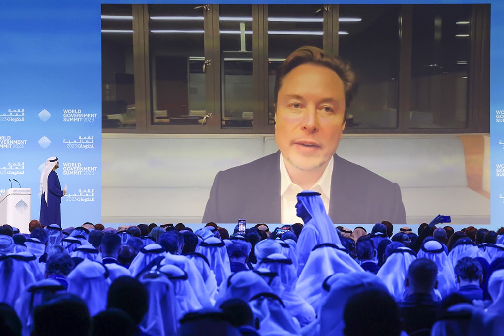 DUBAI: UAE Minister of Cabinet Affairs Mohammad Al-Gergawi (left on stage) speaks with Elon Musk attendingnthe World Government Summit virtually in Dubai on February 15, 2023. — AFP