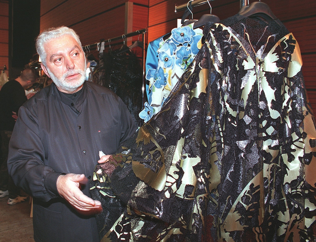 PARIS: In this file photo taken on January 20, 1999, Spanish Designer Paco Rabanne checks a dress before his 1999 Spring/Summer haute-couture collection, in Paris. – AFP
