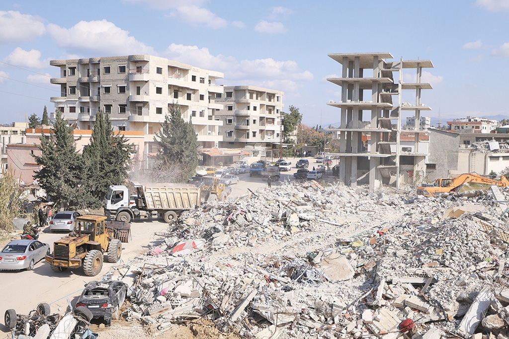 JABLEH, Syria: Search and rescue operations continue in the regime-controlled town of Jableh in the province of Latakia, northwest of the Syrian capital, on February 12 2023, in the aftermath of a deadly earthquake. - AFP 