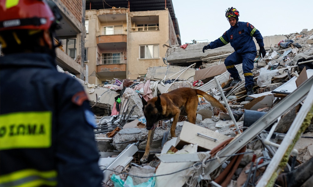 Members of a Greek rescue team work on the site of a collapsed building, as the search for survivors continues, in the aftermath of a deadly earthquake, in Hatay, Turkey February 11, 2023.