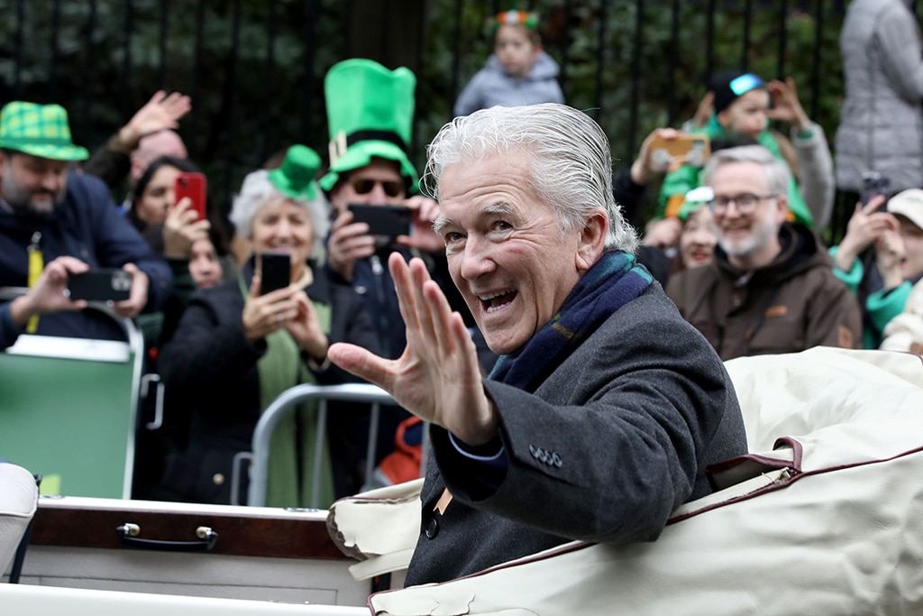International guest, US actor Patrick Duffy, at the head of the parade, waves to the crowds at the annual St Patrick's Day parade in Dublin.— AFP photos 