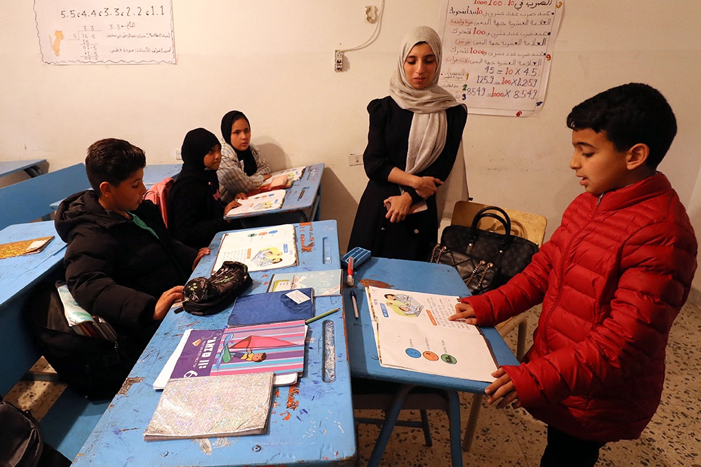 In this picture Libyan students study Tamazight language at a school in Zuwara, a majority-Berber community near the border with Tunisia.—AFP photos
