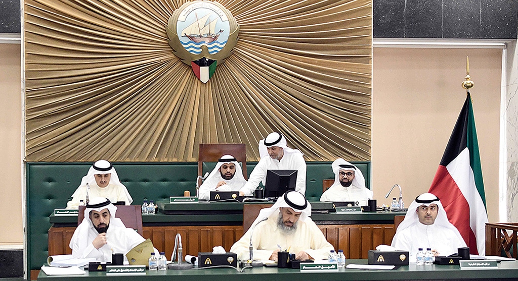 KUWAIT: The Municipal Council members attend a session on Monday. Members approved initiatives for Kuwait commercial banks to reconstruct the sites damaged by the fire of Souq Al-Mubarakiya and a beautification project of Shuwaikh beach. - KUNA photos