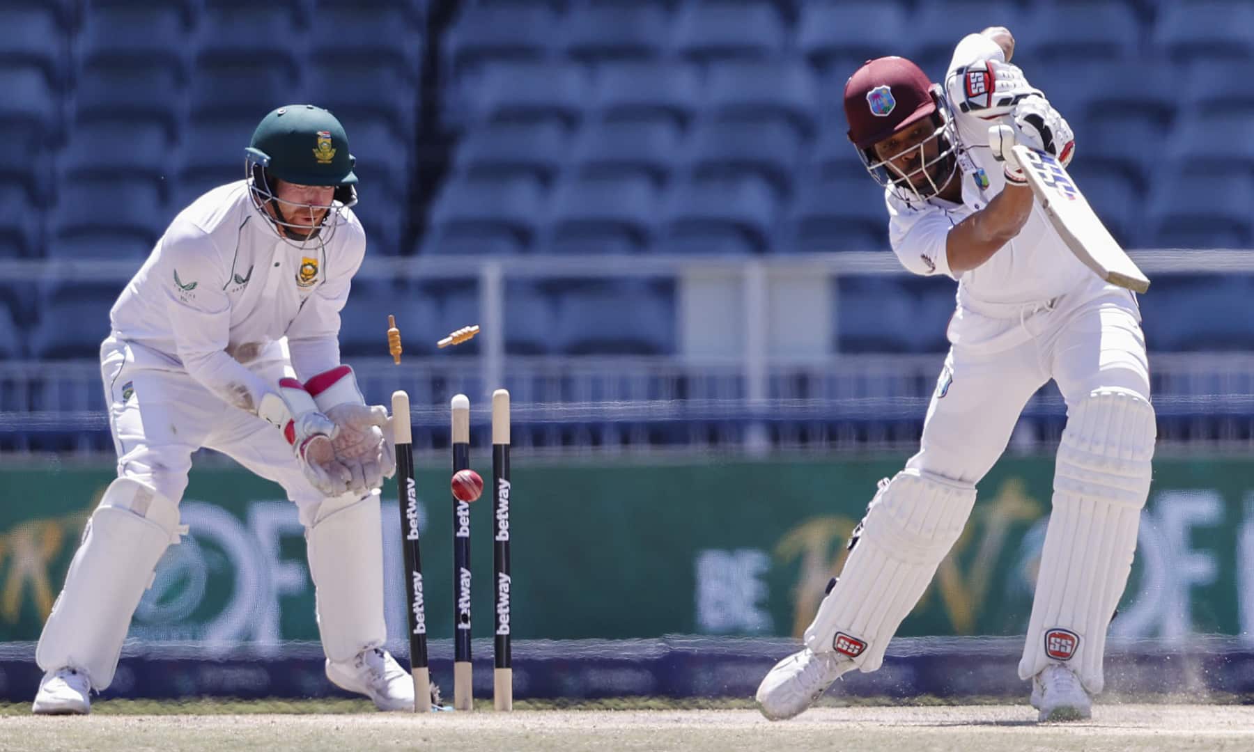 JOHANNESBURG: West Indies’ Roston Chase (R) is bowled by South Africa’s Keshav Maharaj (not seen) as South Africa’s wicketkeeper Heinrich Klaasen (L) looks on during the fourth day of the second Test cricket match between South Africa and West Indies at The Wanderers Stadium in Johannesburg on March 11, 2023. — AFP