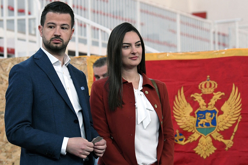 PODGORICA:  Montenegrin presidental candidate Jakov Milatovic (L) and his wife arrive to vote for the presidential election at a polling station in Podgorica, on March 19, 2023. Montenegrins cast ballots on March 19 in a presidential contest pitting the Adriatic nation's longest serving leader Milo Djukanovic against a range of rivals hoping to shake up the country's political scene. – AFP
