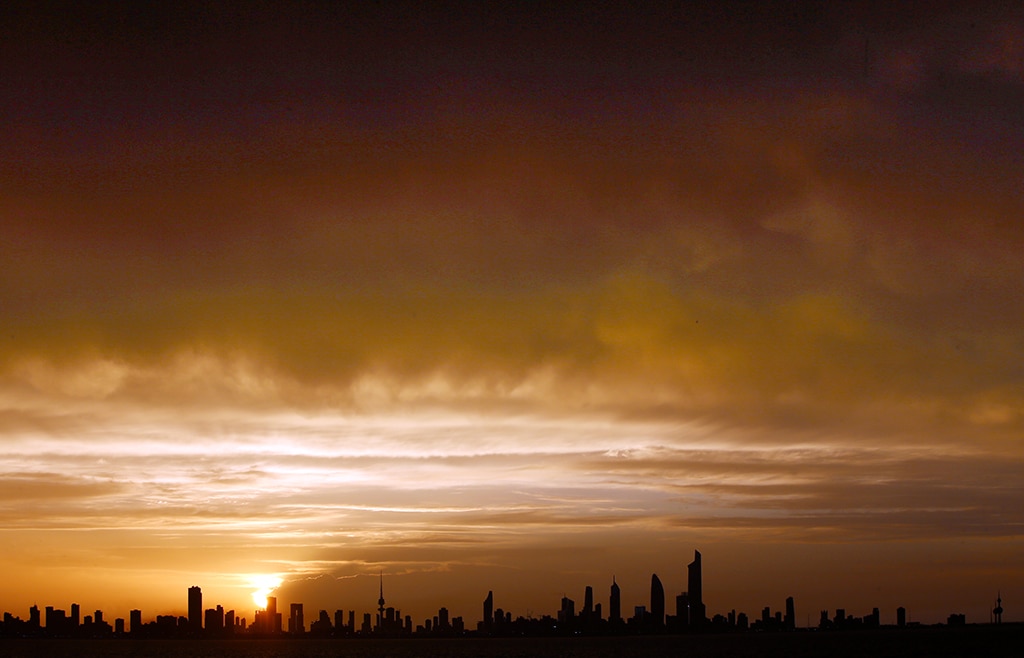 KUWAIT: Kuwait City's skyline is seen during sunset on a cloudy evening. - Photo by Yasser Al-Zayyat.