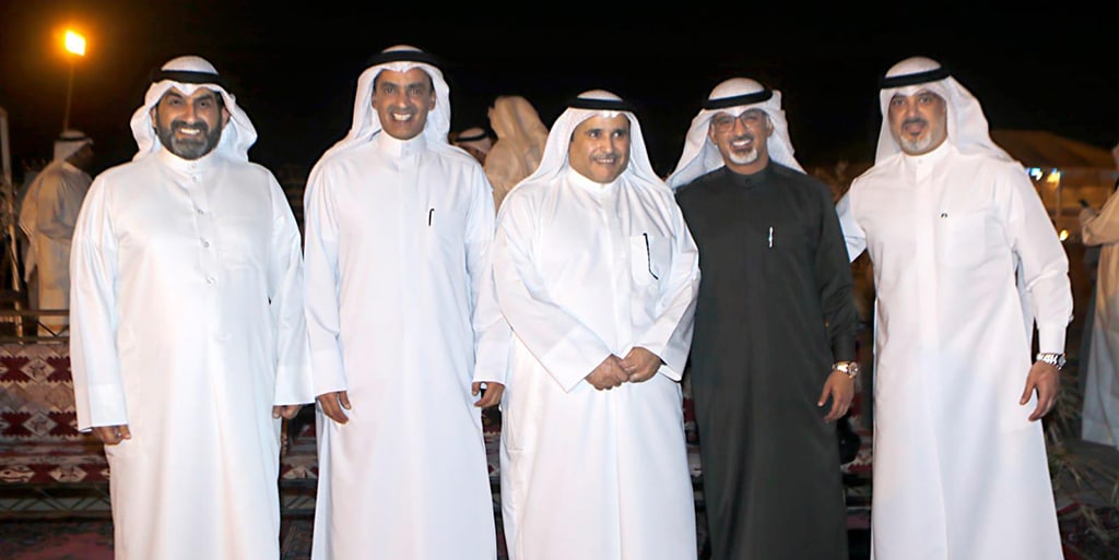 KUWAIT: Sports and media personalities pose for a group photo.