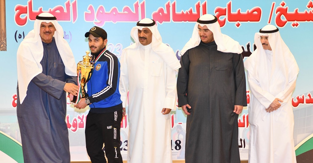 Winner of the Men Trap contest Naser Al-Maqlad receives the trophy.- KUNA photos