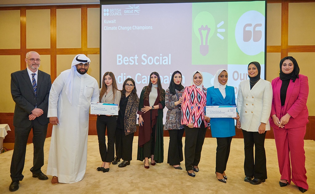 KUWAIT: Country Director at the British Council Tony Skinner poses with winners at the event.